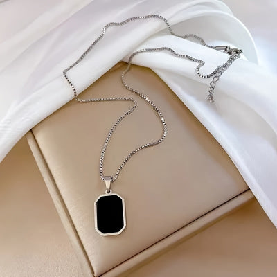 An elegant 18k Golden-plated stainless steel rectangular black pendant necklace, perfect for daily wear and vacation accessories, an ideal Valentine's Day gift for women
