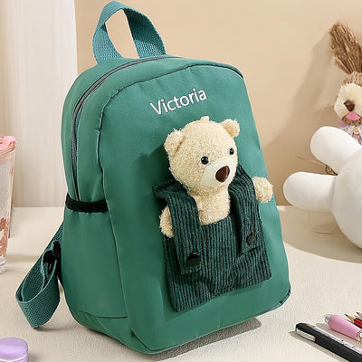 حقيبة ظهر ANLEWO على شكل دب تيدي شخصي مع اسم مخصص - حقيبة ظهر قطيفة لطيفة مع فتحات على شكل قلب وأشرطة قابلة للتعديل، وإغلاق بسحاب، حقيبة مدرسية خفيفة الوزن للبنات والأولاد وهدايا عيد الميلاد (وردي، أزرق، أحمر، أخضر، أسود، أصفر)