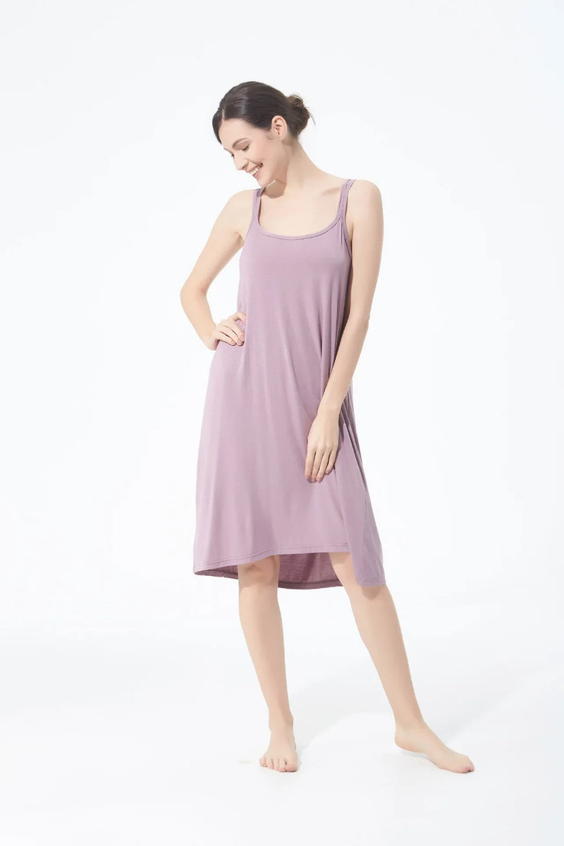 تنورة نسائية كاجوال أنيقة مثيرة مفتوحة الظهر كبيرة الحجم ذات قاعدة خلفية جميلة تنورة منزلية فضفاضة متقاطعة بأكمام طويلة