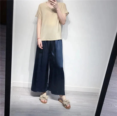 بيردسكي، قطعة واحدة من بنطلونات كابري واسعة الساق، مصنوعة من حرير التوت الطبيعي ١٠٠٪، مقاس إضافي، وخصر مرتفع. مقاس S-39