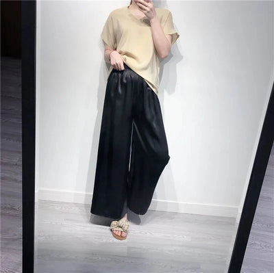 بيردسكي، قطعة واحدة من بنطلونات كابري واسعة الساق، مصنوعة من حرير التوت الطبيعي ١٠٠٪، مقاس إضافي، وخصر مرتفع. مقاس S-39