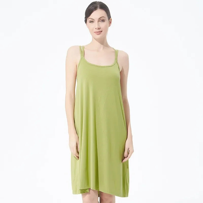 تنورة نسائية كاجوال أنيقة مثيرة مفتوحة الظهر كبيرة الحجم ذات قاعدة خلفية جميلة تنورة منزلية فضفاضة متقاطعة بأكمام طويلة