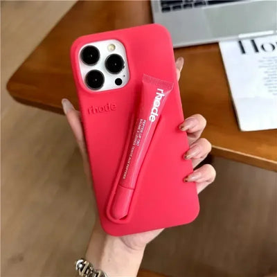 جراب سيليكون بحامل أحمر شفاه 9 ألوان لهاتف iPhone 16E 16 15 14 13 12 11 Pro Max Plus غطاء حامل محمول لملمع الشفاه Funda