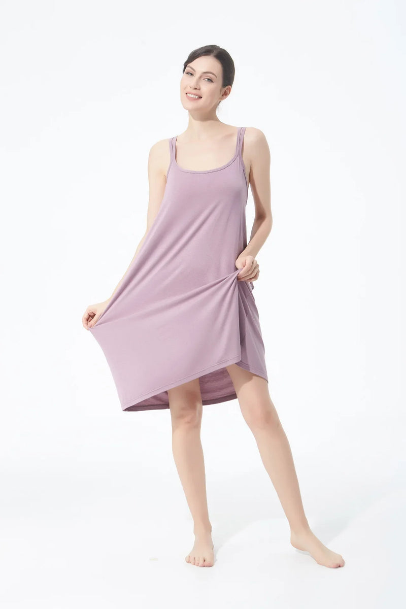 تنورة نسائية كاجوال أنيقة مثيرة مفتوحة الظهر كبيرة الحجم ذات قاعدة خلفية جميلة تنورة منزلية فضفاضة متقاطعة بأكمام طويلة