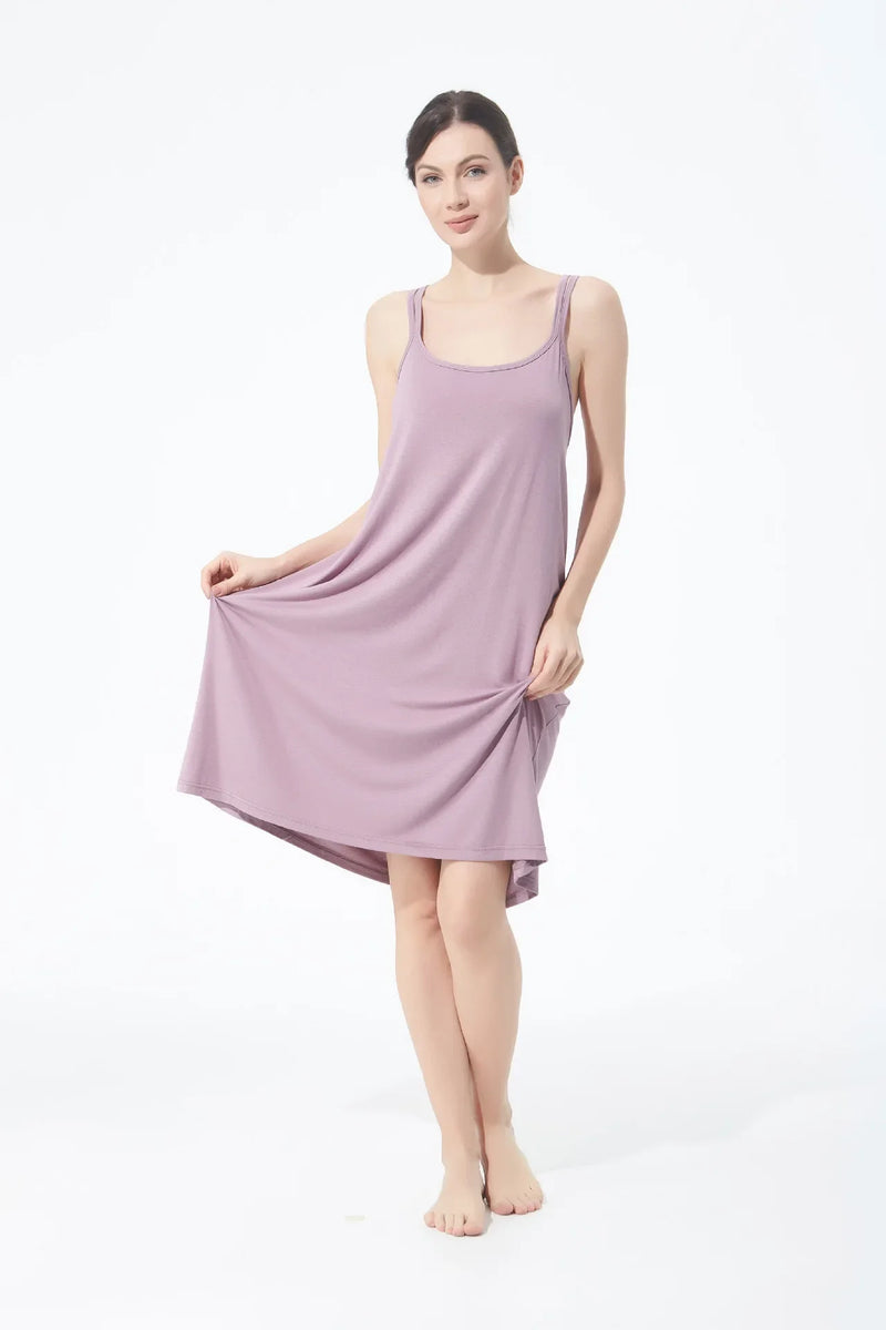 تنورة نسائية كاجوال أنيقة مثيرة مفتوحة الظهر كبيرة الحجم ذات قاعدة خلفية جميلة تنورة منزلية فضفاضة متقاطعة بأكمام طويلة