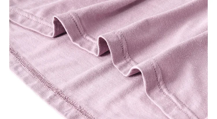 تنورة نسائية كاجوال أنيقة مثيرة مفتوحة الظهر كبيرة الحجم ذات قاعدة خلفية جميلة تنورة منزلية فضفاضة متقاطعة بأكمام طويلة