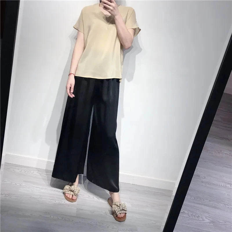 بيردسكي، قطعة واحدة من بنطلونات كابري واسعة الساق، مصنوعة من حرير التوت الطبيعي ١٠٠٪، مقاس إضافي، وخصر مرتفع. مقاس S-39