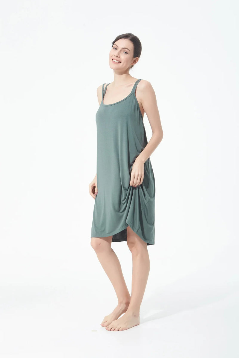 تنورة نسائية كاجوال أنيقة مثيرة مفتوحة الظهر كبيرة الحجم ذات قاعدة خلفية جميلة تنورة منزلية فضفاضة متقاطعة بأكمام طويلة