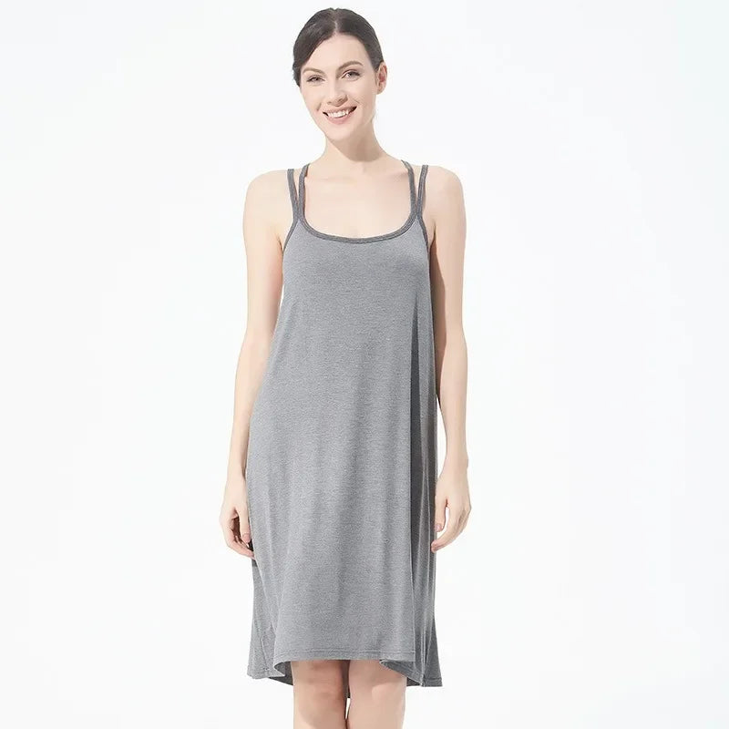 تنورة نسائية كاجوال أنيقة مثيرة مفتوحة الظهر كبيرة الحجم ذات قاعدة خلفية جميلة تنورة منزلية فضفاضة متقاطعة بأكمام طويلة