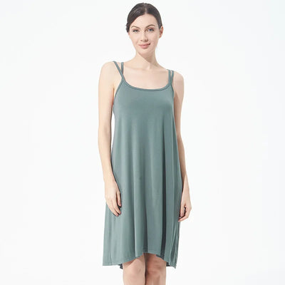 تنورة نسائية كاجوال أنيقة مثيرة مفتوحة الظهر كبيرة الحجم ذات قاعدة خلفية جميلة تنورة منزلية فضفاضة متقاطعة بأكمام طويلة