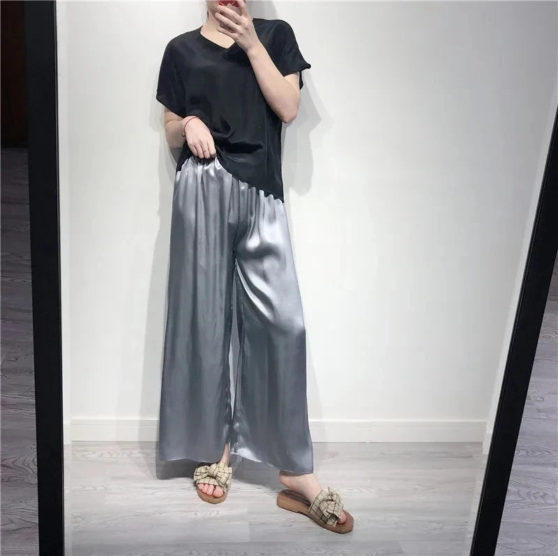 بيردسكي، قطعة واحدة من بنطلونات كابري واسعة الساق، مصنوعة من حرير التوت الطبيعي ١٠٠٪، مقاس إضافي، وخصر مرتفع. مقاس S-39