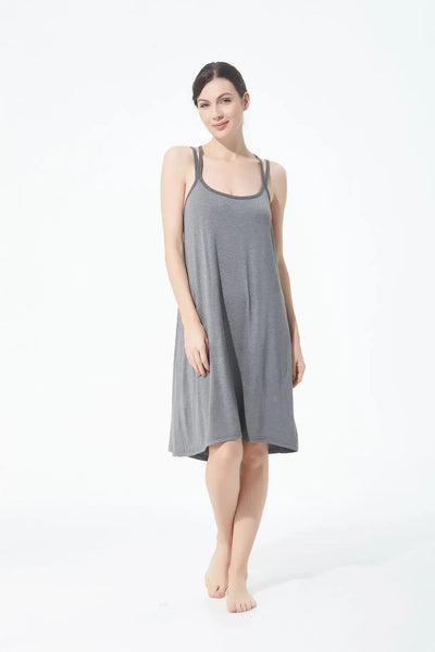 تنورة نسائية كاجوال أنيقة مثيرة مفتوحة الظهر كبيرة الحجم ذات قاعدة خلفية جميلة تنورة منزلية فضفاضة متقاطعة بأكمام طويلة