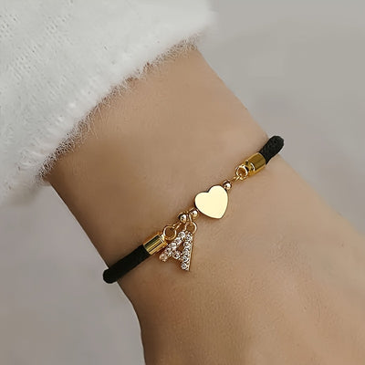 18K Golden Plated Heart Charm Bracelet with Synthetic Zirconia Letter Pendants A-Z, Simple Classic Black Polyester Cord, Adjustable for Daily Wear and Gift-Giving